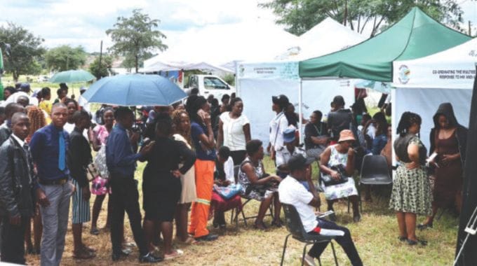 People queue for free medical checks and treatment during a medical outreach organised by Angel of Hope Foundation in Masvingo yesterday.