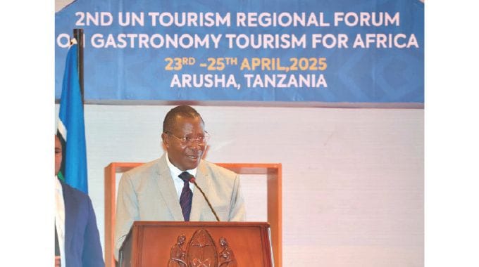 Tanzania’s vice president Dr Philip Isdor Mpango addresses delegates while officially opening the Second UN Tourism Regional Forum on Gastronomy Tourism for Africa in Arusha, Tanzania, yesterday