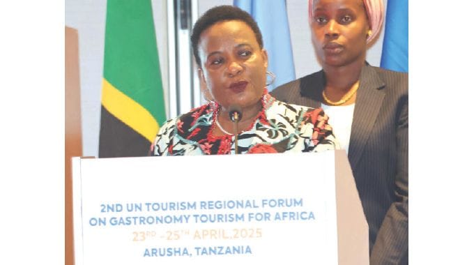 First Lady Dr Auxillia Mnangagwa delivers her keynote address to delegates at the official opening of the Second UN Tourism Regional Forum on Gastronomy Tourism for Africa in Arusha, Tanzania, yesterday