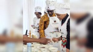 Chinese national wins First Lady’s traditional cook-out competition after winning the hearts of judges with his culinary skills.