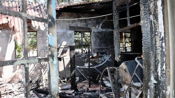 Part of the dormitories, beds and belongings of schoolchildren that were destroyed by fire at the school