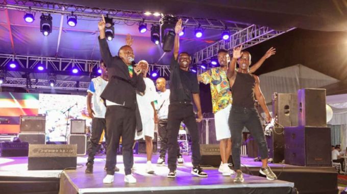 Vee from Botswana performs with his dance group during the Cultural Gastronomic Dinner at State House in Harare on Friday night.