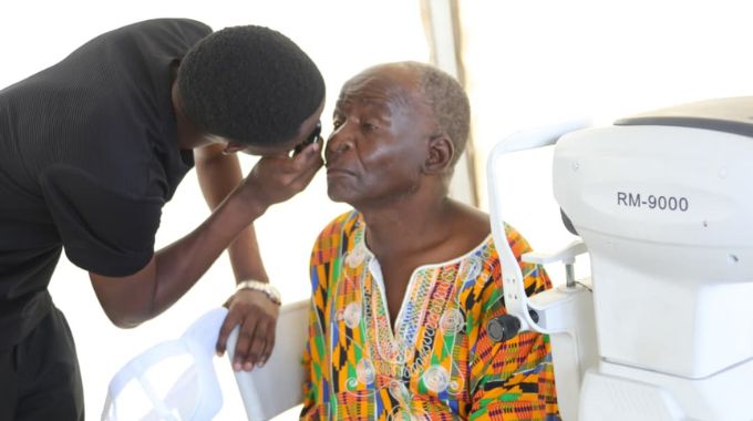 An elderly man has his eyesight checked at the oversubscribed Chief Negomo Health Expo at Maria Theresa Clinic in Chiweshe yesterday