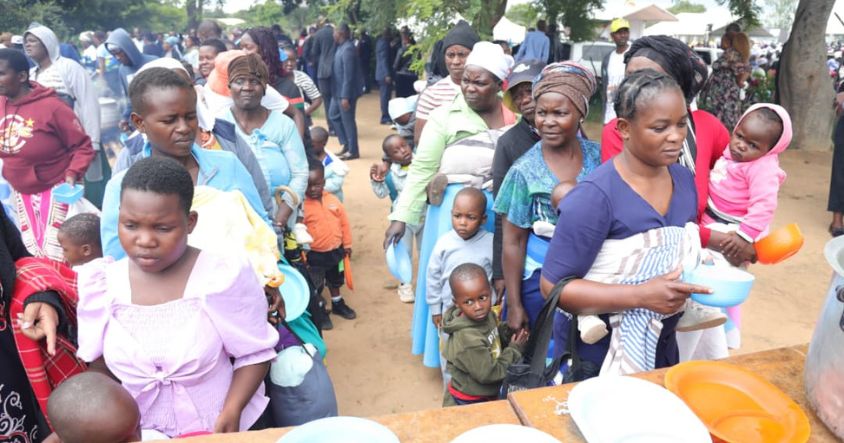 Mothers and their children queue for porridge during the launch of First Lady Dr Auxillia Mnangagwa’s oversubscribed Toddlers’ Warm Bowl Project in Epworth