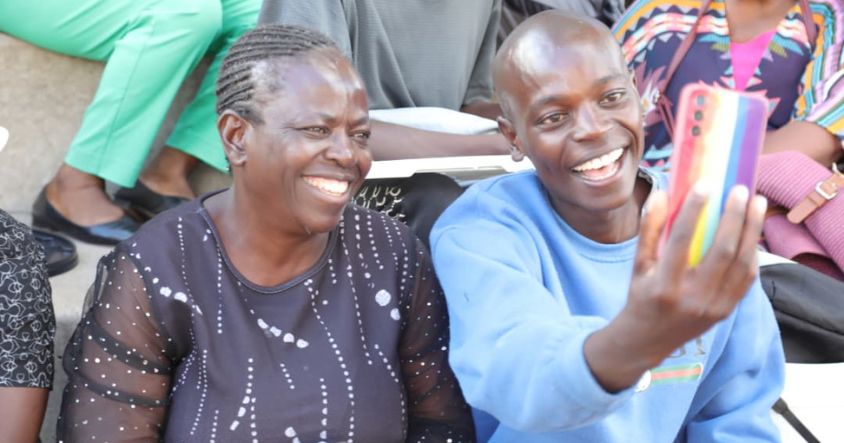 An Angel of Hope Drug Rehabilitation Centre 5th intake participant shares a light moment with her parent during the send-off to the vocational training centre