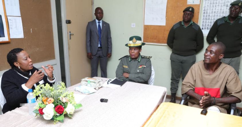 First Lady Dr Auxillia Mnangagwa speaks to Guruve serial murder suspect Anymore Zvitsva during a visit at Chikurubi Maximum Prison in Harare