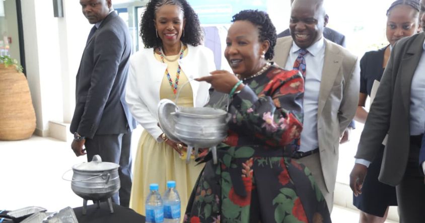 Environment Patron Lady Dr Auxillia Mnangagwa admires pots made from recycled waste during the International Solid Waste Association conference in Harare yesterday.