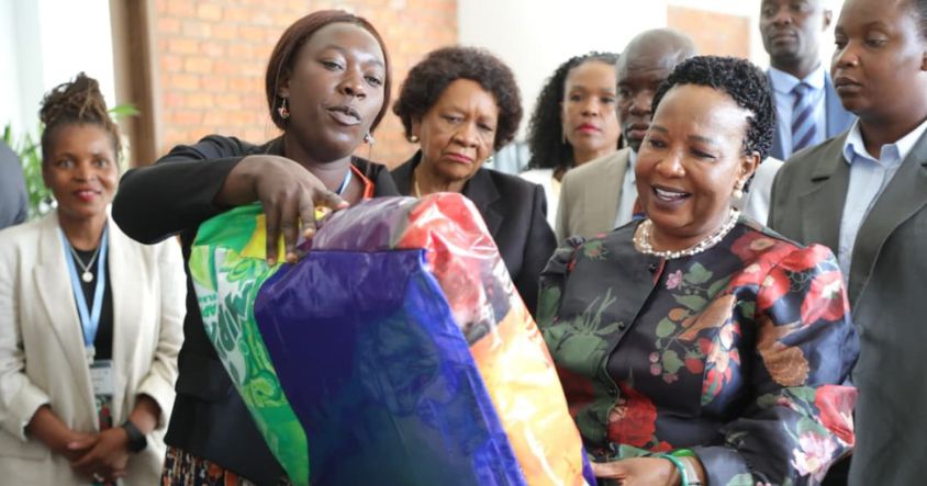 Environment Patron First Lady Dr Auxillia Mnangagwa takes a closer look at recycled waste products during the International Solid Waste Association conference in Harare