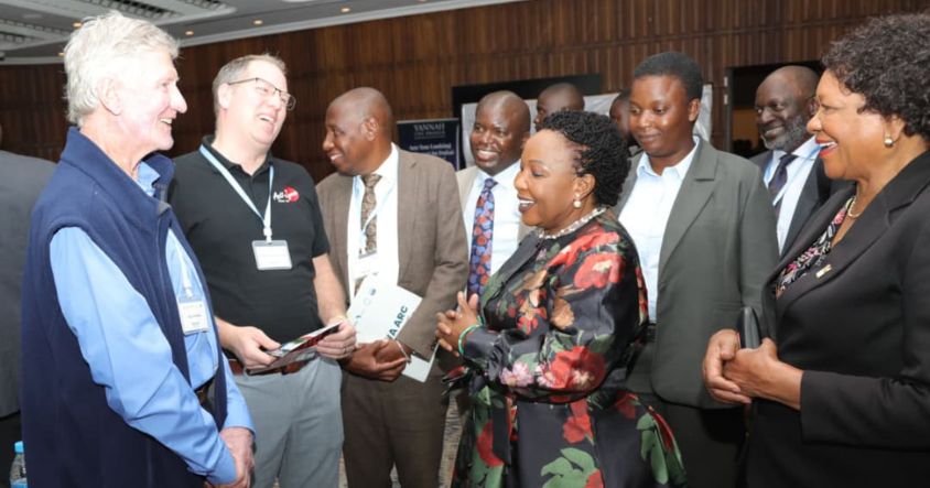 Environment Patron First Lady Dr Auxillia Mnangagwa shares a moment with Acti-Zyme officials from Canada at their exhibition stand during the International Solid Waste Association conference in Harare yesterday.