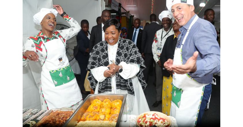 First Lady Dr Auxillia Mnangagwa and Tourism and Hospitality Industry Minister Barbara Rwodzi are shown Serbian traditional dishes by Serbian Ambassador to Zimbabwe Radisa Grujic at the Zimbabwe International Trade Fair in Bulawayo
