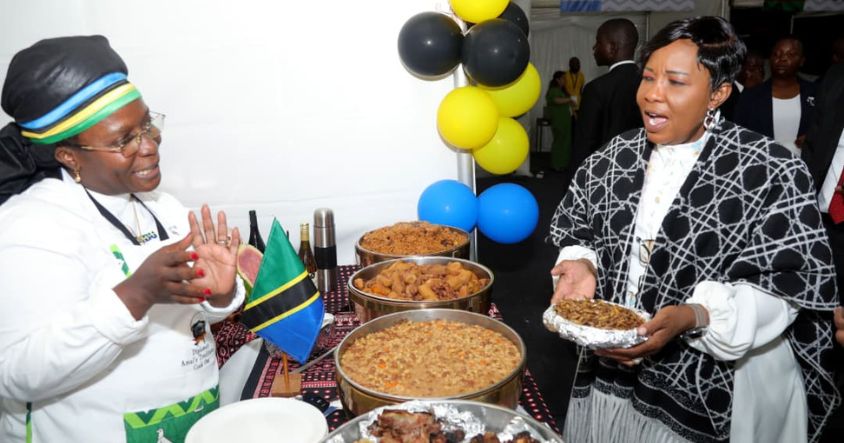 First Lady Dr Auxillia Mnangagwa is shown Tanzania traditional dishes by Ambassador Suzan Kaganda at Amai’s Gastronomy Kitchen, at the Zimbabwe International Trade Fair in Bulawayo