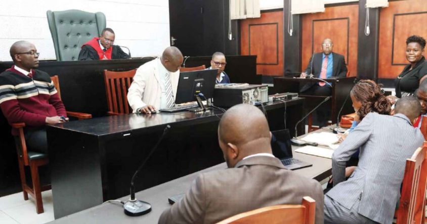 A magistrate presides over a rape case at Rotten Row Magistrates Court