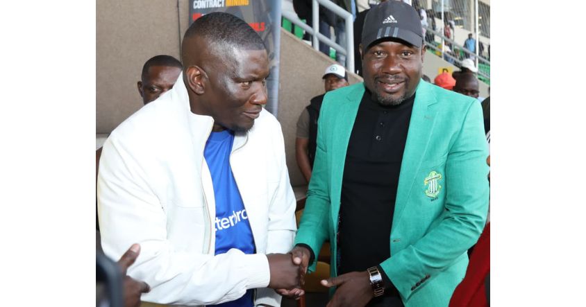 Scotland FC president Scott Sakupwanya (left) and CAPS United president Farai Jere display good sportsmanship following their teams’ match at the National Sports Stadium.