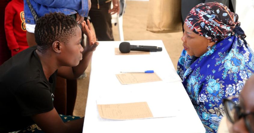 First Lady Dr Auxillia Mnangagwa assists with the registration of a girl for treatment and rehabilitation during the ninth intake of the Angel of Hope Drug Rehabilitation Programme in Mbare, Harare.