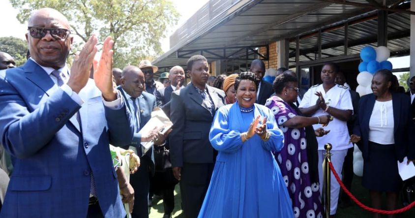 First Lady Dr Auxillia Mnangagwa and Health and Child Care Minister Dr Douglas Mombeshora celebrate after cutting the ribbon to officially open the Dr Auxillia Mnangagwa School of Nursing in Kadoma