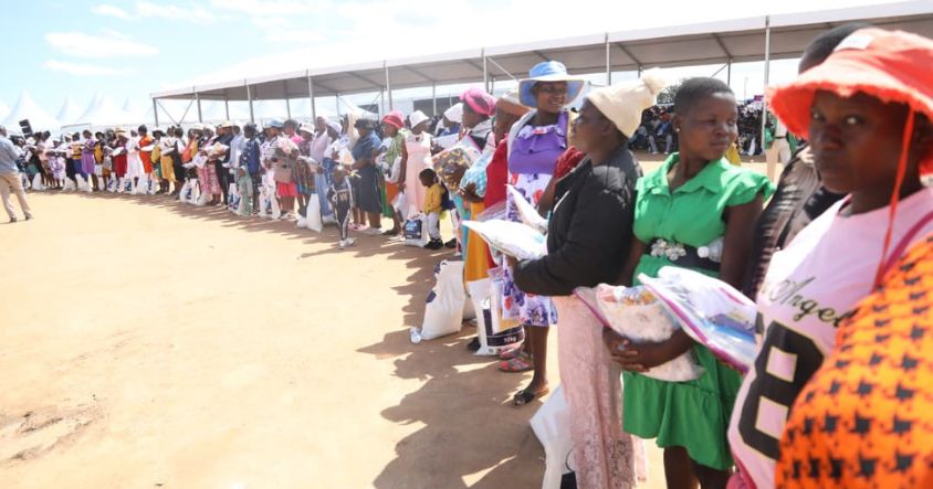 People receiving food hampers from the Angel of Hope Foundation