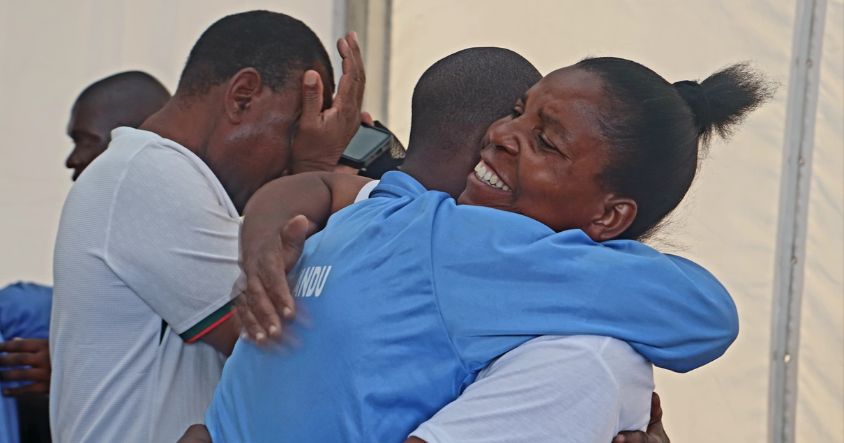 A mother hugs her child at the Angel of Hope Rehabilitation Centre